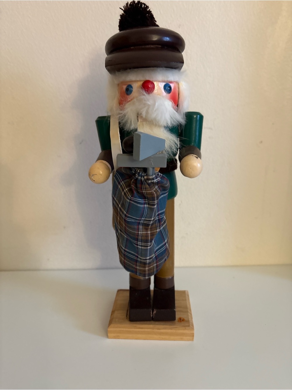 Wooden Green and Brown Nutcracker Figurine with Plaid Kilt